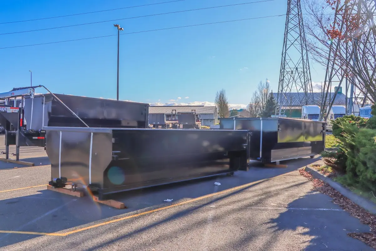 Roll-off dumpster ready for waste disposal at job site for Concrete Dumpster Rental in Valley